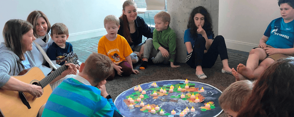 Kids with Judy and guitar